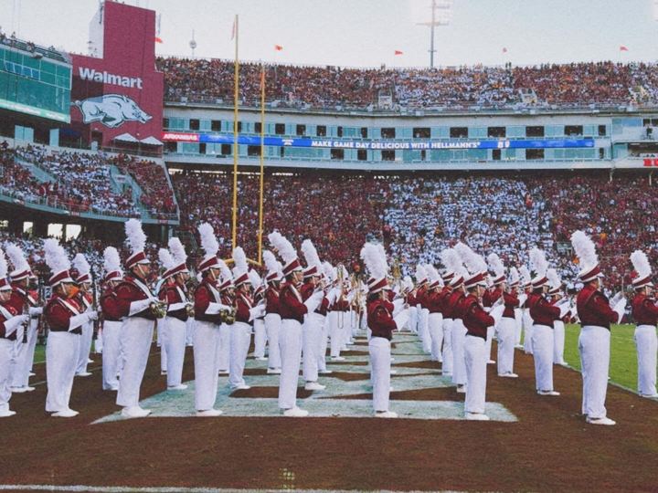 Marching band filling the field before kickoff