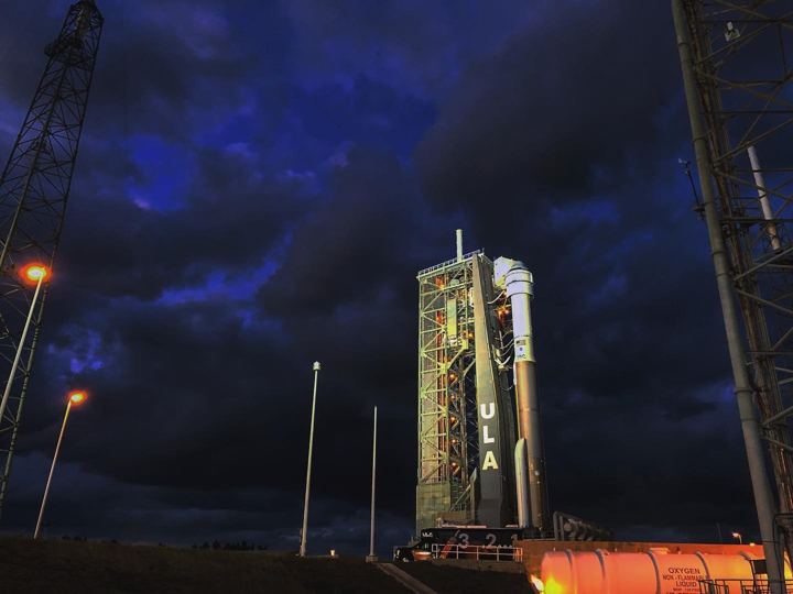 Launch tower lit at dusk