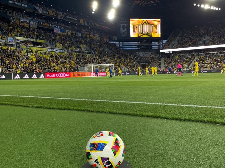 Match ball at the corner during a night game