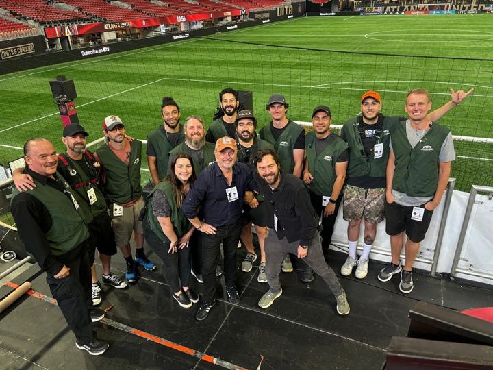 Production crew group photo on the pitch