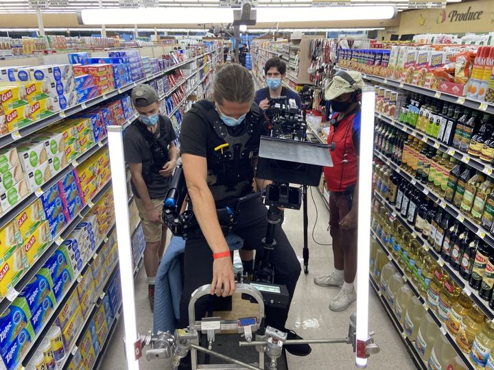Gimbal operator working a grocery store aisle
